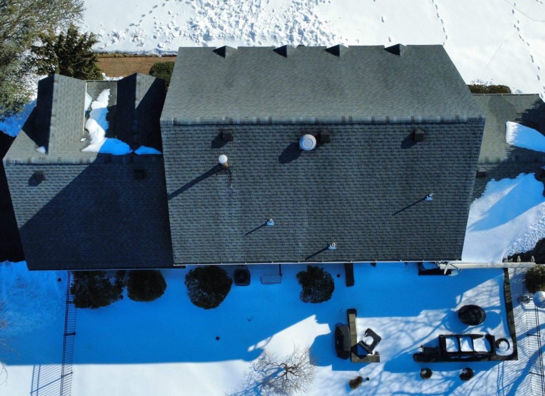 Dedicated Tetti Roofing expert evaluating a Bound Brook, NJ roof for optimal energy efficiency and safety standards