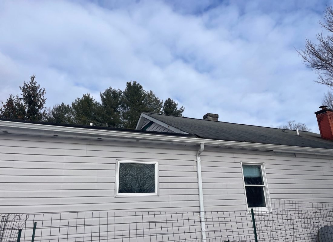 Skilled Tetti Roofing contractor performing a meticulous roof inspection in Middlesex County to ensure durability and safety